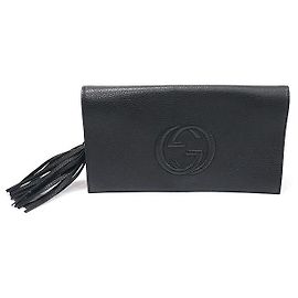 Gucci Clutch Soho in pelle nera con frange