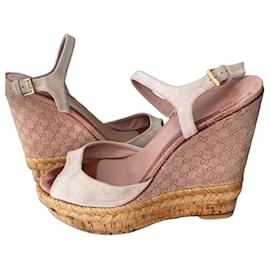 Beige suede wedge sandals by Gucci