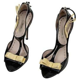 Miu Miu T-Strap Sandalen Lackleder mit Schleifen schwarz