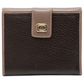 Pequeño monedero Gucci de piel de ternera bicolor marrón con G entrelazado