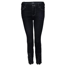 Chanel, schwarze Jeans mit floralem Laserschnittdruck