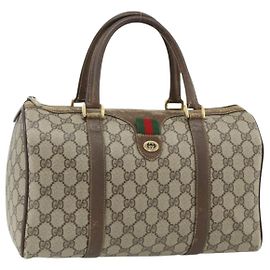 Bolso Boston de PVC beige y rojo de la línea Sherry GG Supreme de GUCCI 40 02 007 Auth 178058