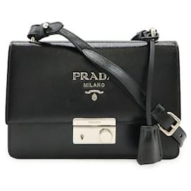 Clutch e borsa a spalla in pelle smaltata nera Prada