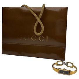 Reloj de pulsera para mujeres Vintage Gucci en tono dorado modelo 1500L