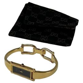 Montre pour femmes Vintage Gucci en acier doré modèle 1500L