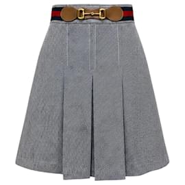 Falda de pliegues en azul marino / blanco / dorado con detalle de franja Web de Gucci