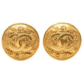 Boucles d'oreilles rondes à clip en plaqué or avec CC doré de Chanel