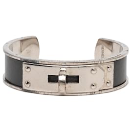 Bracelet manchette Kelly en cuir noir et plaqué palladium Hermès