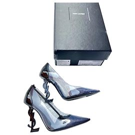 Saint Laurent Opyum Pumps aus PVC und Lackleder