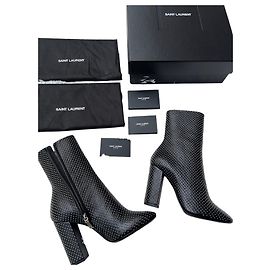 Stivaletti in pelle Saint Laurent con borchie