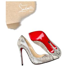Christian Louboutin Python Leder Pumps