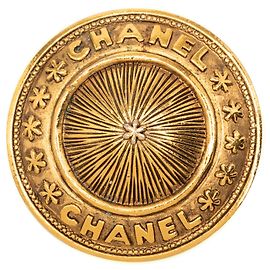 Broche redonda Chanel Gold chapada en oro