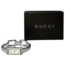 Reloj de pulsera tipo brazalete Vintage Gucci 1500L en acero inoxidable Plata Esfera blanca