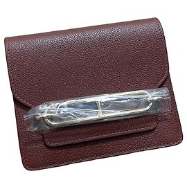 Cartera Hermès Roulis Slim en cuero rojo