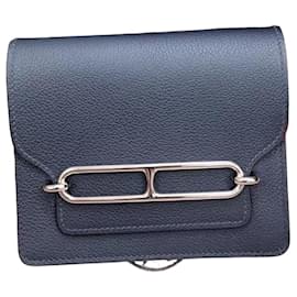 Cartera Hermès Roulis Slim de cuero azul
