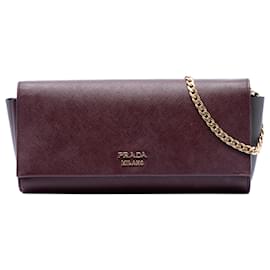 Clutch Bibliotheque Prada in Saffiano rosso e pelle City con catena