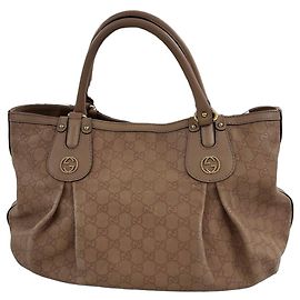 Borsa a mano Gucci Scarlett in pelle monogramma GG - Beige