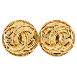 Orecchini Chanel Gold CC placcati oro tondi con clip