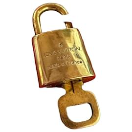Louis Vuitton Lucchetto dorato con la sua chiave