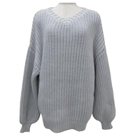Autre Marque V-Ausschnitt Strickpullover Whim Gazette