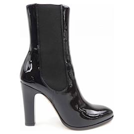 Botas altas de piel de becerro charol Chanel G30090X31136