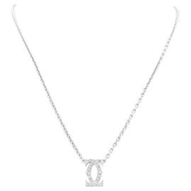 Collar Cartier, "Double C", oro blanco y diamantes.