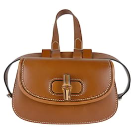 Pochete Gucci em couro marrom