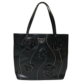 Borsa a mano in pelle con logo triangolo Prada e motivo floreale