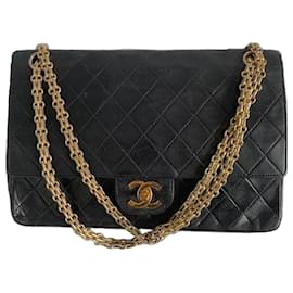 Chanel Classic Flap Bag Schwarz Lammleder