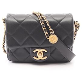 Borsa a tracolla Chanel Matelassé Mini Flap in nero