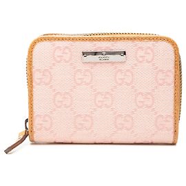Monedero con cremallera de lona GG Gucci rosa