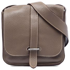 Pochette Steve in pelle Clemence marrone Hermès