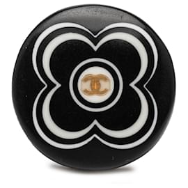 Anello Chanel Camelia con logo CC in resina nera e tono oro