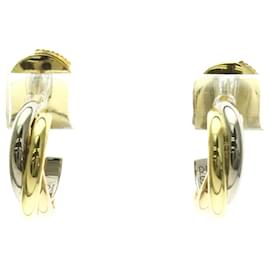Orecchini a mezzaluna Trinity di Cartier