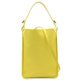 Borsa Tote Balenciaga Tool 2.0 North South in pelle di vitello martellata gialla, piccola