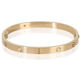 Cartier Love Armband aus Gelbgold und Diamanten, Modell Medium
