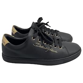 Dolce & Gabbana Sneaker aus schwarzem Leder mit Gold-Details