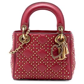 Lady Dior Supple in agnello rosso mini con cannage e borchie