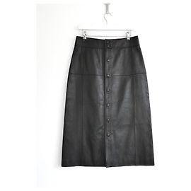 Saint Laurent Midirock aus schwarzem Leder mit Knopfleiste