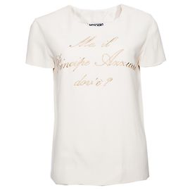 Moschino Couture, Cremefarbener Top mit goldenem Text.
