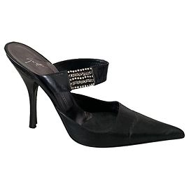 Mules Giuseppe Zanotti in pelle nera con strass