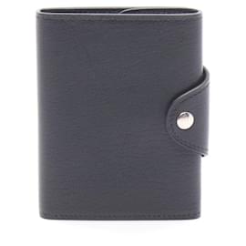 Hermès Cartera compacta de tres pliegues Iliade negra Hermes