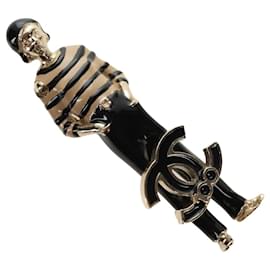 Spilla Mademoiselle Doll CHANEL in metallo Gold CC Auth 181111V - Chanel