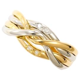 Autre Marque Bague anneau en platine et or jaune sertie de diamants