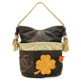 Chanel Fishnet Rope Camellia Tote Bag Canvas Leather Wood