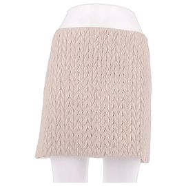 Minifalda acolchada Miu Miu beige