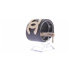 Bracciale rigido Chanel CC logo resina blu notte