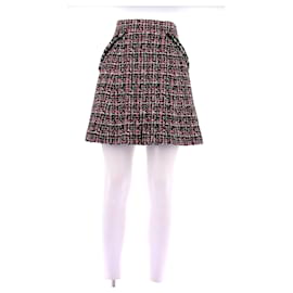 Falda de tweed rosa y negra Chanel