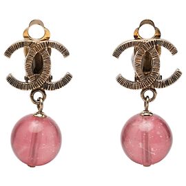 Orecchini a clip Chanel Gold CC in ottone e resina