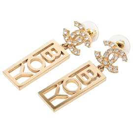 Orecchini Chanel Boy Swing Push Back in ottone Gold CC Strass
